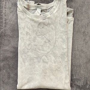 Bella lace breezy flower muscle tunic